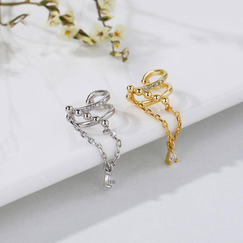 Cross-bone Beads Inlaid with Diamond Ear Clips Temperament Tassel Light Luxury Feel Without Piercings New Style of Wearable Earrings
Cross-bone Beads Inlaid with Diamond Ear Clips Temperament Tassel Light Luxury Feel Without Piercings New Style of Wearable Earrings
