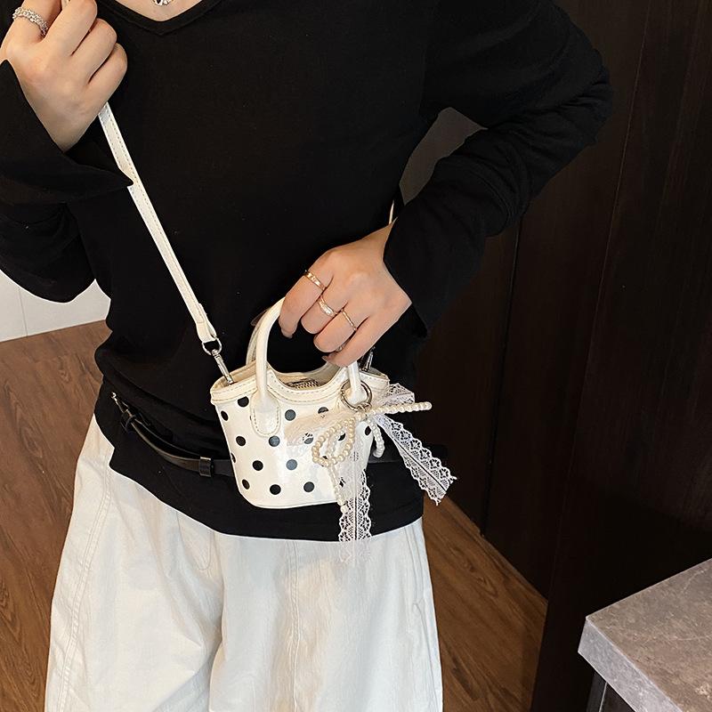 Niche Mini Polka Dot Bag Women s 2025 New Korean Version Fashion Versatile Messenger Bag Portable Small Bucket Bag no pendant белый
Niche Mini Polka Dot Bag Women s 2025 New Korean Version Fashion Versatile Messenger Bag Portable Small Bucket Bag no pendant белый