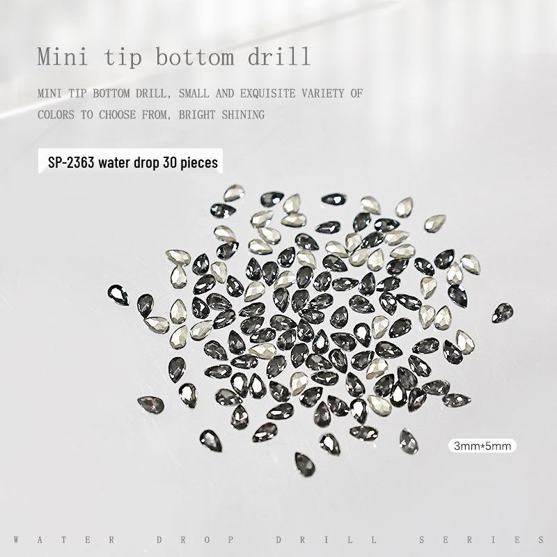 Набор из 30 штук переливающихся страз в форме капли воды для нейл-арта - Прозрачные, неправильной формы и с заостренным дном.
Набор из 30 штук переливающихся страз в форме капли воды для нейл-арта - Прозрачные, неправильной формы и с заостренным дном.