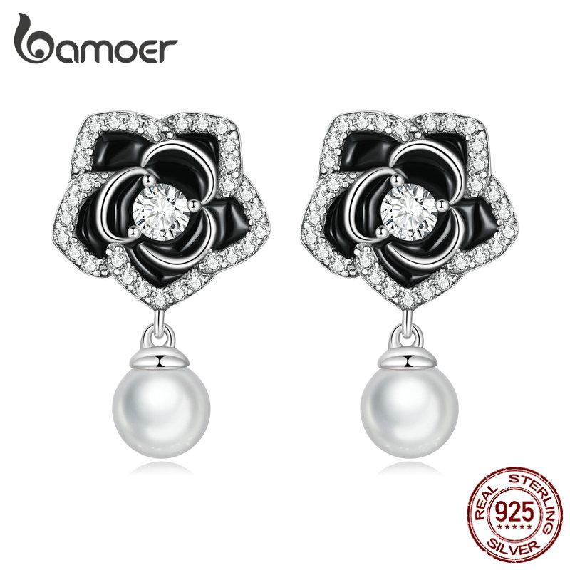 Женские серьги-гвоздики BAMOER из стерлингового серебра 925 пробы с черной камелией, винтажные серьги с жемчугом, изящные ювелирные изделия с цирконием
Женские серьги-гвоздики BAMOER из стерлингового серебра 925 пробы с черной камелией, винтажные серьги с жемчугом, изящные ювелирные изделия с цирконием