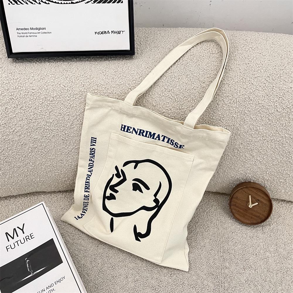 Korean Style Female Avatar Print Canvas Shoulder Bag with Outer Pocket
Korean Style Female Avatar Print Canvas Shoulder Bag with Outer Pocket