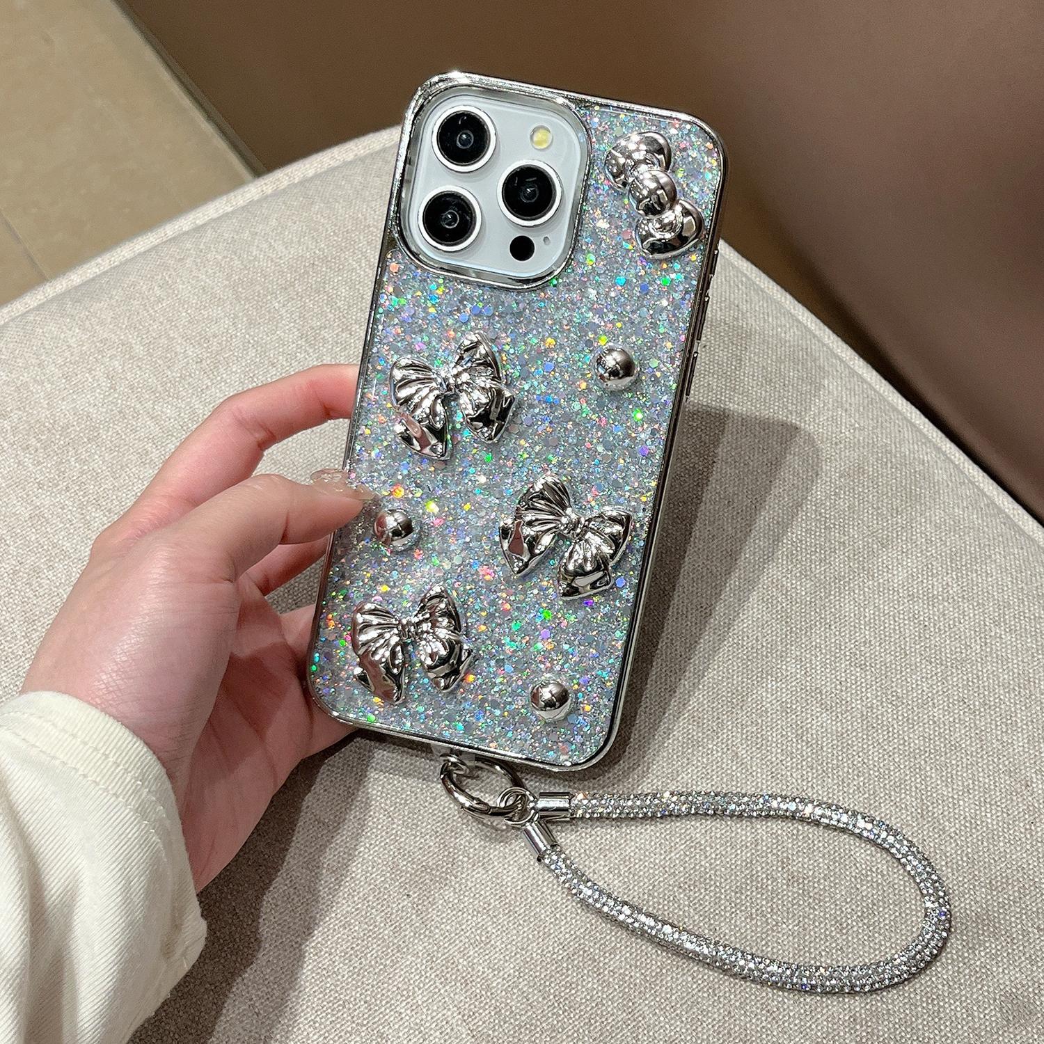 For iPhone 16 Case Bowknot Silver Beads Glitter Epoxy Electroplated PC TPU Cover with Strap A
For iPhone 16 Case Bowknot Silver Beads Glitter Epoxy Electroplated PC TPU Cover with Strap A