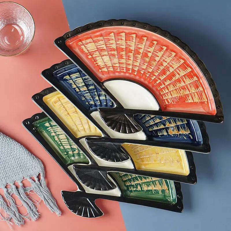Dumpling plate with vinegar dish creative ceramic partition plate Japanese hand-painted sushi plate fan-shaped snack plate
Dumpling plate with vinegar dish creative ceramic partition plate Japanese hand-painted sushi plate fan-shaped snack plate