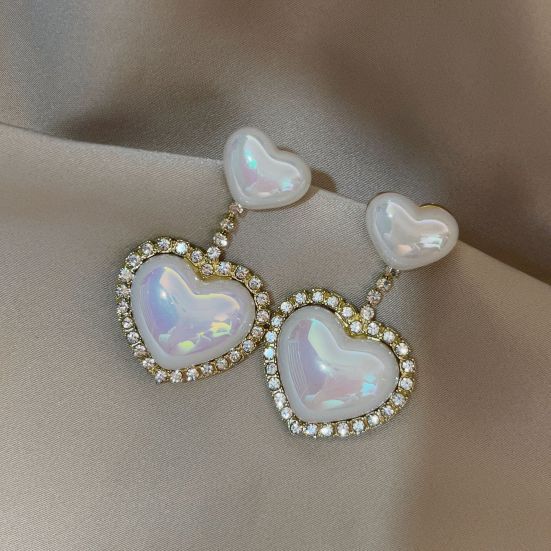 Серьги Symphony Heart с жемчугом и бриллиантами
Серьги Symphony Heart с жемчугом и бриллиантами