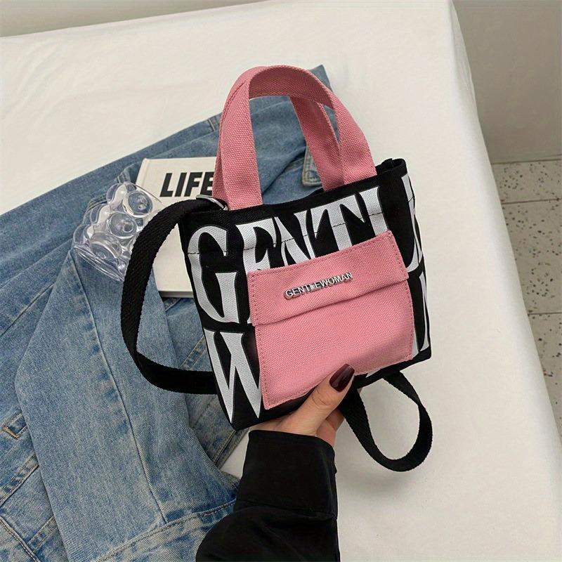 Fashionable Letter Printed Canvas Crossbody Bags, Casual Large Capacity Contrasting Handbag, Suitable for Commuting Occasions
Fashionable Letter Printed Canvas Crossbody Bags, Casual Large Capacity Contrasting Handbag, Suitable for Commuting Occasions