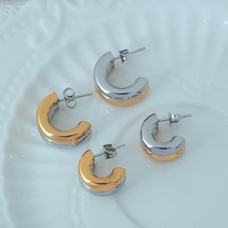 Women s Two-Tone Titanium Steel C-Shaped Earrings: Stainless Steel High-End Design in Gold and Silver with Hollow Letter Detail Large (Pair)
Women s Two-Tone Titanium Steel C-Shaped Earrings: Stainless Steel High-End Design in Gold and Silver with Hollow Letter Detail Large (Pair)