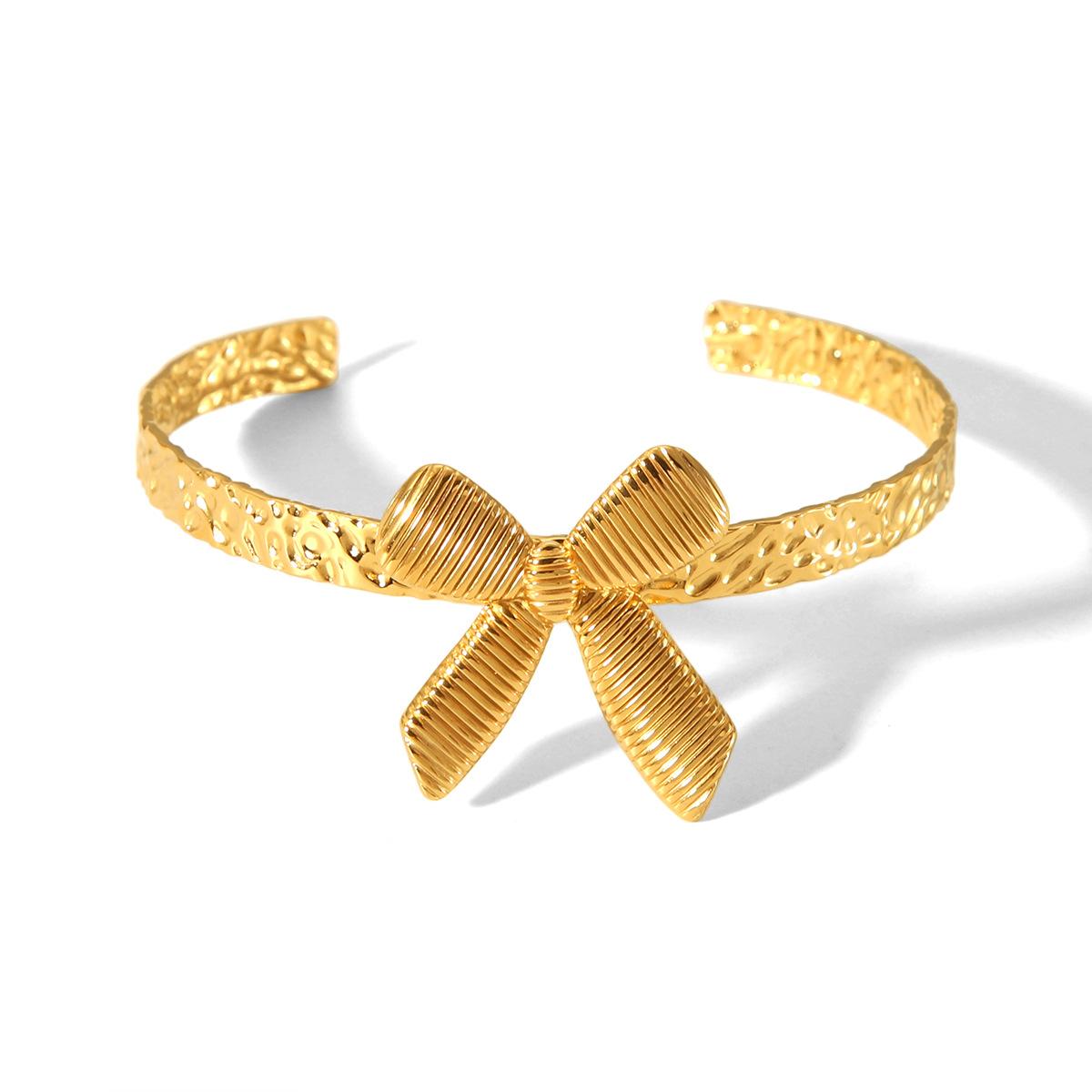 New 18K Gold Stainless Steel Bow Hammered Bangle for Women, Fashionable High-end Titanium Steel Hand Jewelry
New 18K Gold Stainless Steel Bow Hammered Bangle for Women, Fashionable High-end Titanium Steel Hand Jewelry