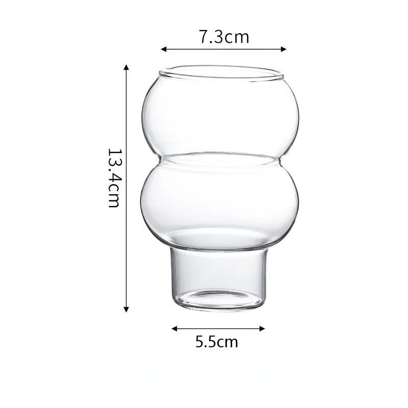 Стеклянная кружка для коктейля в скандинавском стиле, кофейная кружка, прозрачный шар, стакан для йогурта, мусса, мороженого, десерта, кружка для молочного коктейля 1pcs
Стеклянная кружка для коктейля в скандинавском стиле, кофейная кружка, прозрачный шар, стакан для йогурта, мусса, мороженого, десерта, кружка для молочного коктейля 1pcs