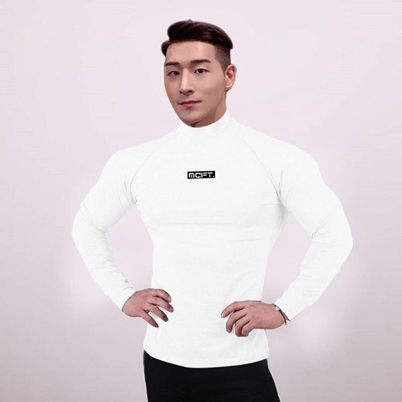 Muscleguys модная брендовая осенняя спортивная одежда для фитнеса мужские тонкие футболки с высоким воротником из полиэстера с длинными рукавами XXL белый
Muscleguys модная брендовая осенняя спортивная одежда для фитнеса мужские тонкие футболки с высоким воротником из полиэстера с длинными рукавами XXL белый