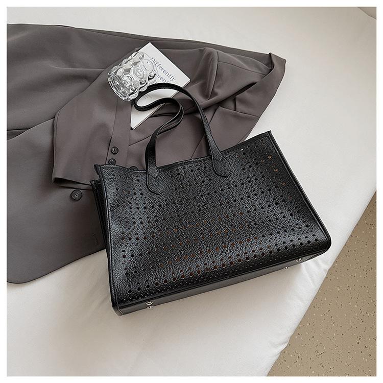 2025 summer new niche design simple casual hollow tote bag fashionable versatile high texture shoulder bag чёрный
2025 summer new niche design simple casual hollow tote bag fashionable versatile high texture shoulder bag чёрный