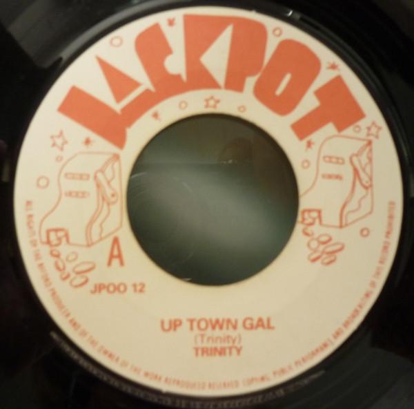 7inch Record TRINITY / KING JAMMY & THE AGGROVAT - Up Town Gal / Channel One A Boy JPOO12 Jackpot Jamaica Reggae, Ska & Dub Used
7inch Record TRINITY / KING JAMMY & THE AGGROVAT - Up Town Gal / Channel One A Boy JPOO12 Jackpot Jamaica Reggae, Ska & Dub Used