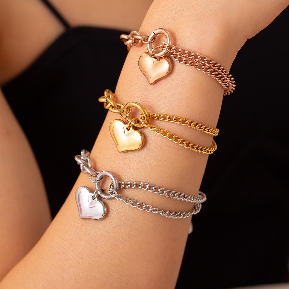 18K Gold Plated Titanium Steel Heart Bracelet with French Minimalist Cuban Chain Design
18K Gold Plated Titanium Steel Heart Bracelet with French Minimalist Cuban Chain Design