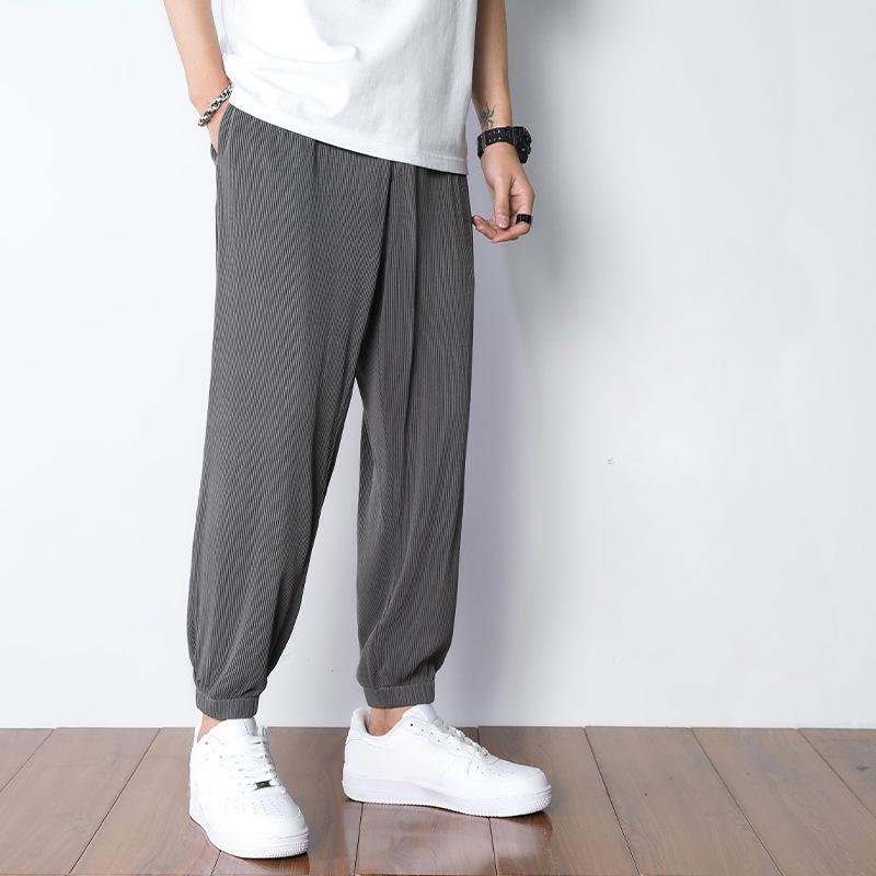 Мужские свободные и повседневные брюки с широкими штанинами, летние узкие брюки с завязками на штанинах, укороченные брюки из ледяного шелка 5XL
Мужские свободные и повседневные брюки с широкими штанинами, летние узкие брюки с завязками на штанинах, укороченные брюки из ледяного шелка 5XL