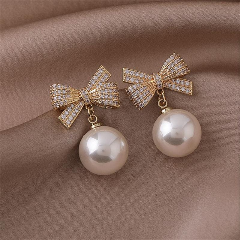 Модные серьги в форме банта с круглыми бусинами и бриллиантами на Рождество, модные женские серьги белый
Модные серьги в форме банта с круглыми бусинами и бриллиантами на Рождество, модные женские серьги белый