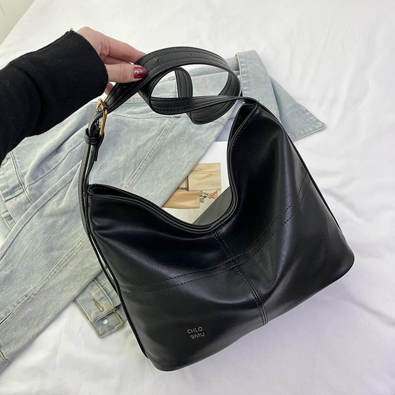 Large capacity bag women s bag 2024 new casual fashion texture shoulder bag portable school bag commuter tote bag чорний
Large capacity bag women s bag 2024 new casual fashion texture shoulder bag portable school bag commuter tote bag чорний