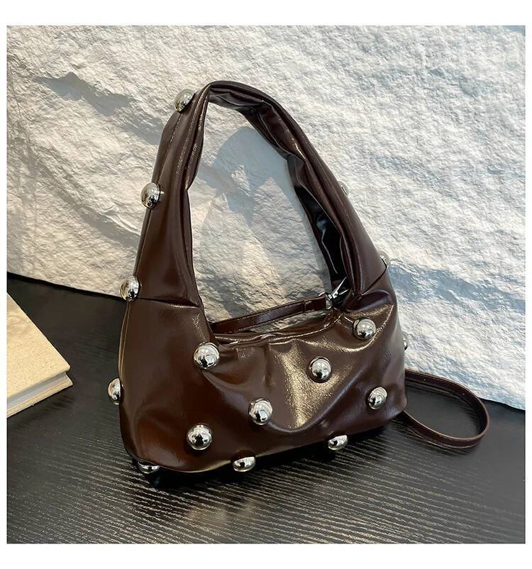 women s bag Korean version fashion rivet personality fashion niche bag ins internet famous armpit bag
women s bag Korean version fashion rivet personality fashion niche bag ins internet famous armpit bag