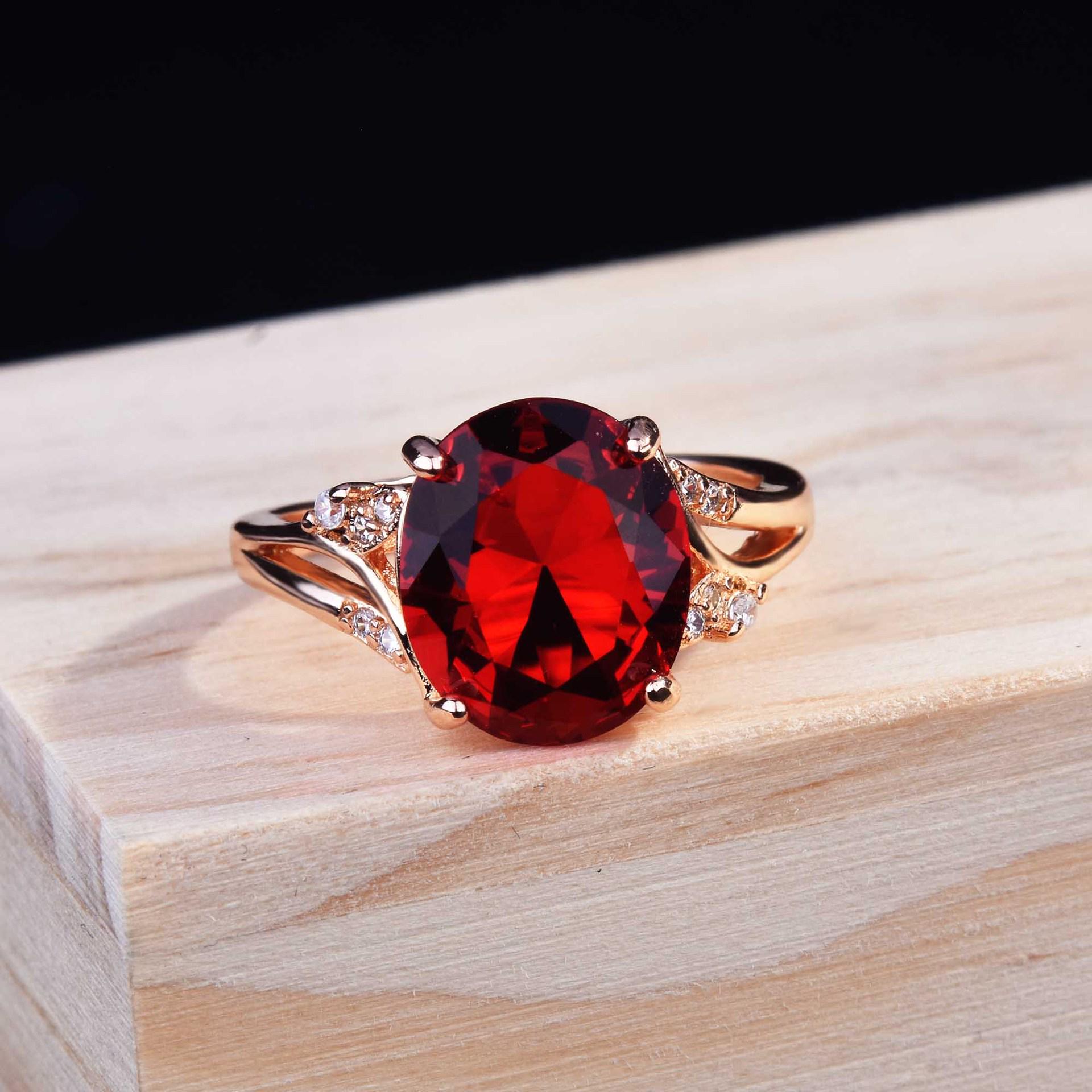 Oval Simulated Red Tourmaline and Zircon Open Ring with Emerald Accents Adjustable Open Ring
Oval Simulated Red Tourmaline and Zircon Open Ring with Emerald Accents Adjustable Open Ring
