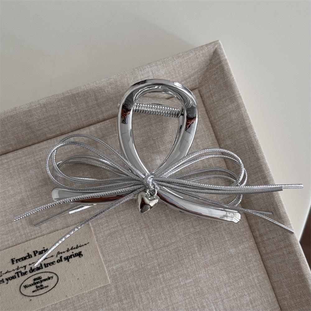 Black Heart Silver Leather Bow Hair Claw Clip
Black Heart Silver Leather Bow Hair Claw Clip