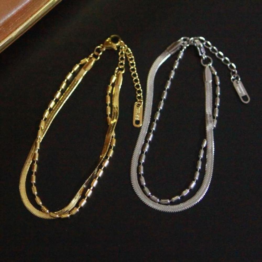 Surgical Steel Gold Snake Chain Two-Line Bracelet in Silver and Gold (S7142529) Silver
Surgical Steel Gold Snake Chain Two-Line Bracelet in Silver and Gold (S7142529) Silver