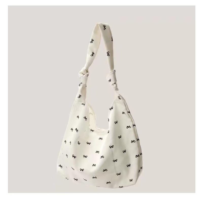 Niche design bow canvas bag shoulder tote bag shopping bag foldable, new fashion literary style білий
Niche design bow canvas bag shoulder tote bag shopping bag foldable, new fashion literary style білий