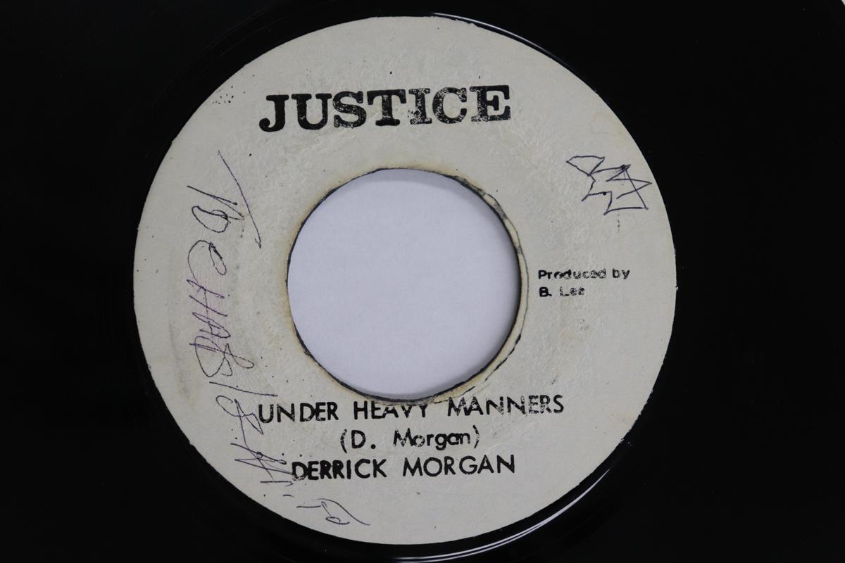 7inch Record DERRICK MORGAN THE AGGROVATORS Under Heavy Manners Full A Manner NONE Justice 1976 Jamaica Reggae Ska Dub Used
7inch Record DERRICK MORGAN THE AGGROVATORS Under Heavy Manners Full A Manner NONE Justice 1976 Jamaica Reggae Ska Dub Used