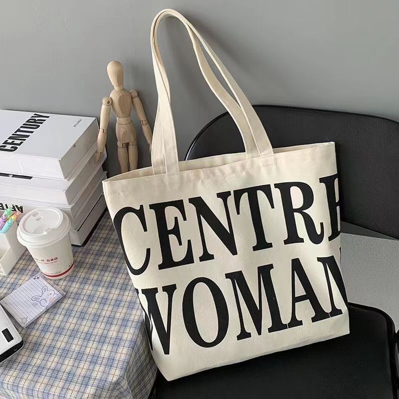 Fashion canvas bag lazy wind large capacity versatile student summer canvas bag women s niche tote bag
Fashion canvas bag lazy wind large capacity versatile student summer canvas bag women s niche tote bag