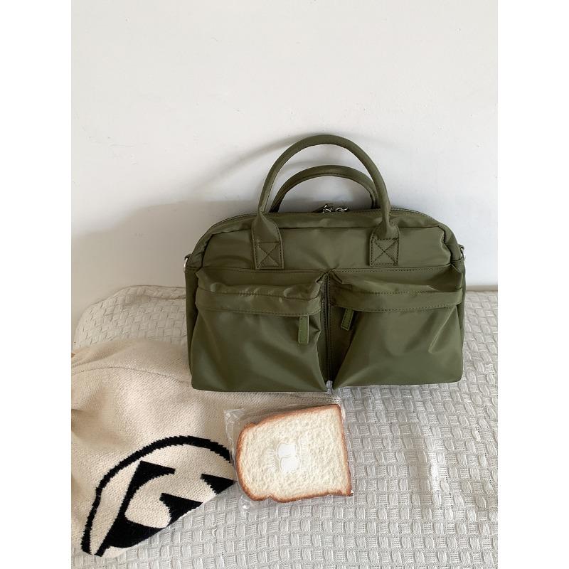 Spring and summer casual messenger bag women s nylon simple large-capacity handbag commuting new women s shoulder bag зелений
Spring and summer casual messenger bag women s nylon simple large-capacity handbag commuting new women s shoulder bag зелений