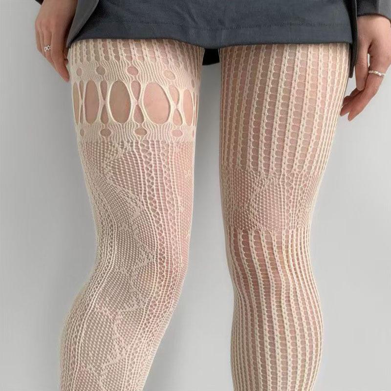 Plus Size Coffee Fishnet Stockings with Vertical Stripes and Leg Ring Detailing One Size
Plus Size Coffee Fishnet Stockings with Vertical Stripes and Leg Ring Detailing One Size