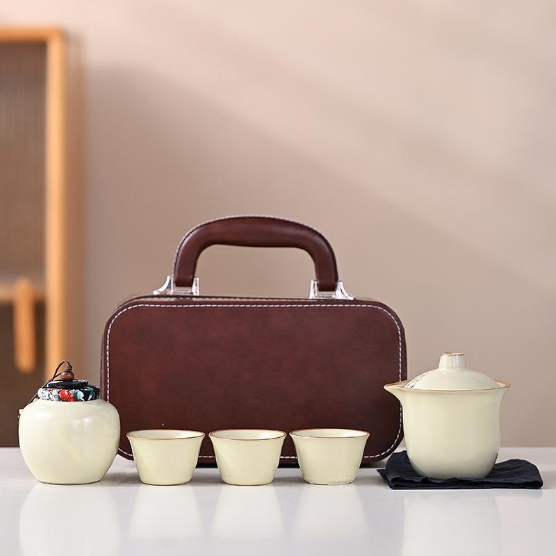 Ru Kiln Travel Kung Fu Tea Set Thousand Mile Country Portable Outdoor Ceramic Teapot
Ru Kiln Travel Kung Fu Tea Set Thousand Mile Country Portable Outdoor Ceramic Teapot