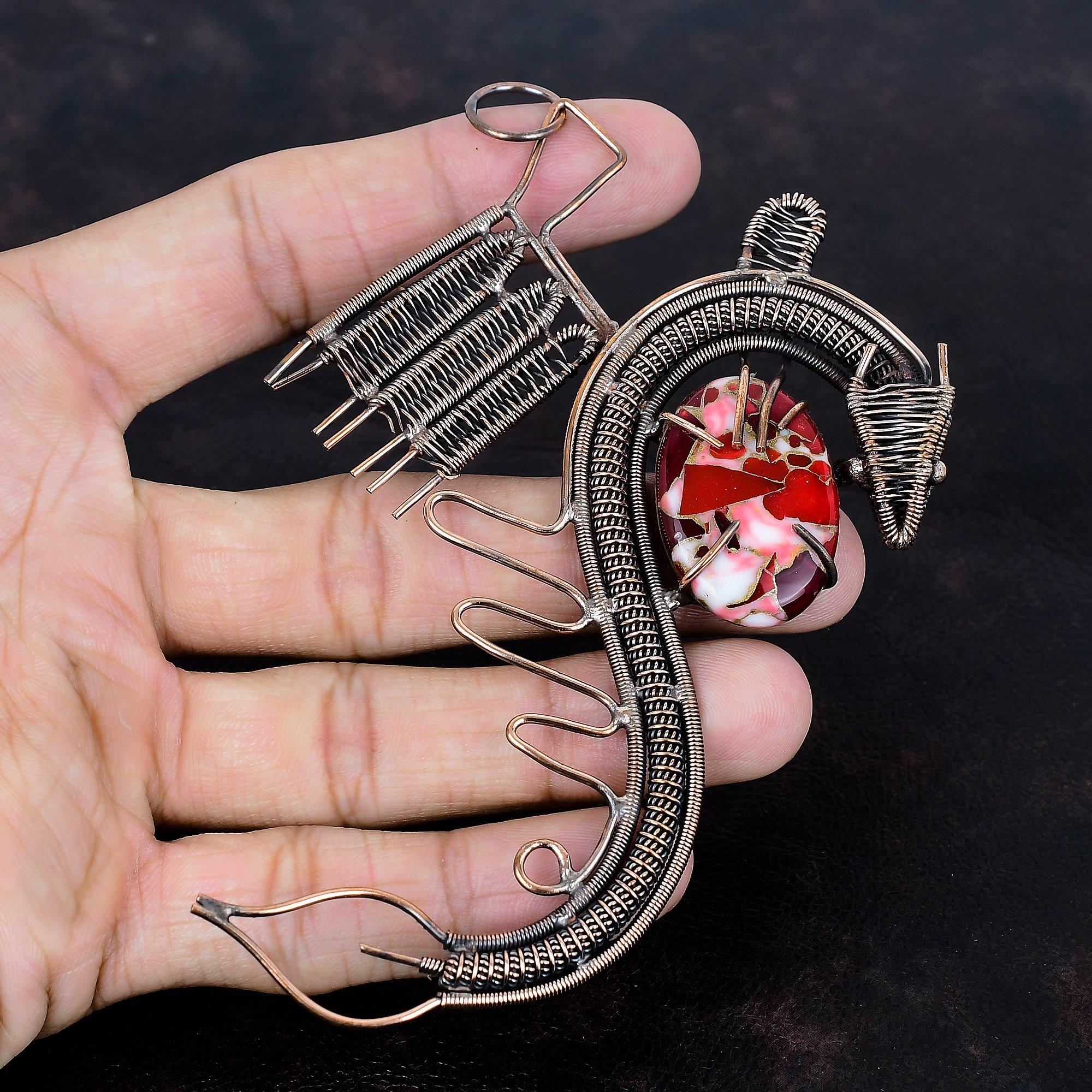 Подвеска из красной бирюзы мохаве Кингман, подвеска, обернутая медной проволокой, дизайн дракона, подвеска ручной работы, драгоценный камень, медные украшения, подарки для него
Подвеска из красной бирюзы мохаве Кингман, подвеска, обернутая медной проволокой, дизайн дракона, подвеска ручной работы, драгоценный камень, медные украшения, подарки для него