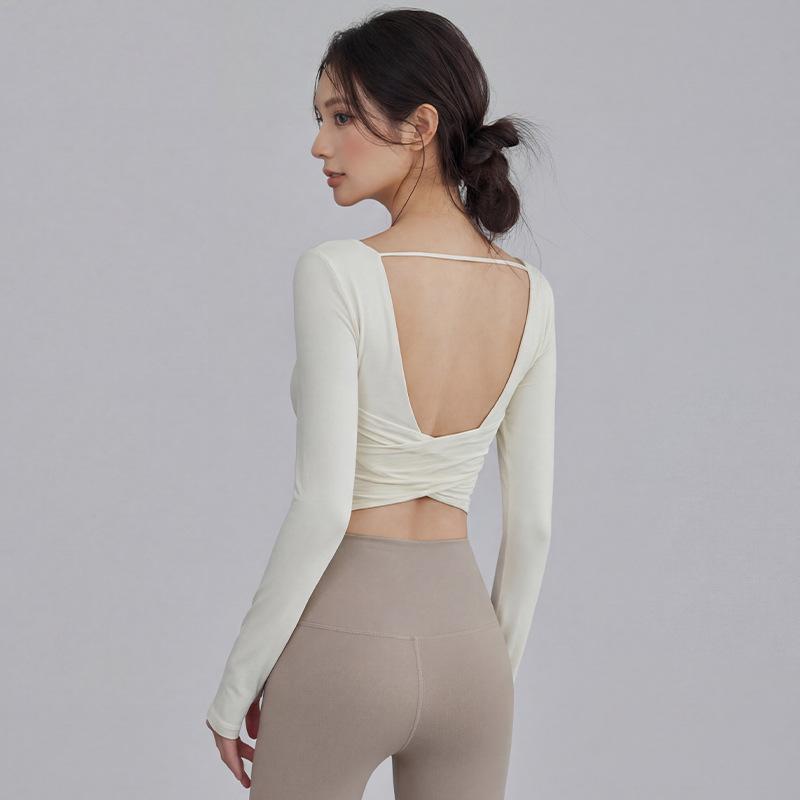 Back-Revealing Long Sleeve Yoga Top with Chest Pads - Slimming Sportswear for Running, Pilates, and Outdoor Fitness Small
Back-Revealing Long Sleeve Yoga Top with Chest Pads - Slimming Sportswear for Running, Pilates, and Outdoor Fitness Small