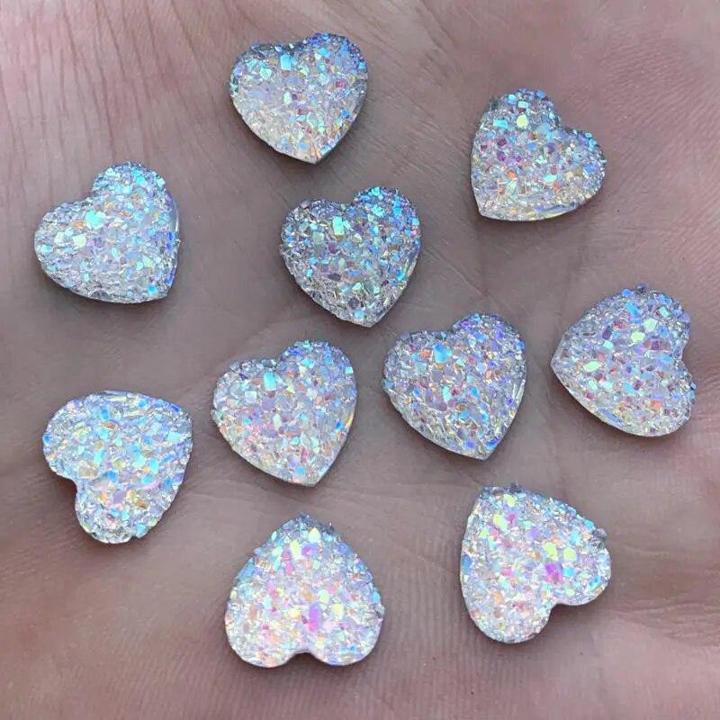 40 шт. 12 мм блестит AB цвета минеральная поверхность сердце смола горный хрусталь плоская задняя часть кабошон камень DIY свадебные украшения поделки
40 шт. 12 мм блестит AB цвета минеральная поверхность сердце смола горный хрусталь плоская задняя часть кабошон камень DIY свадебные украшения поделки