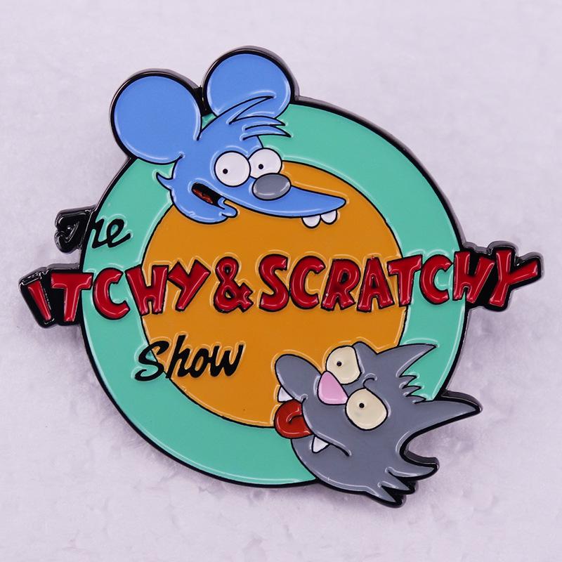 Tom and Jerry & The Simpsons Cartoon Badge Brooch
Tom and Jerry & The Simpsons Cartoon Badge Brooch
