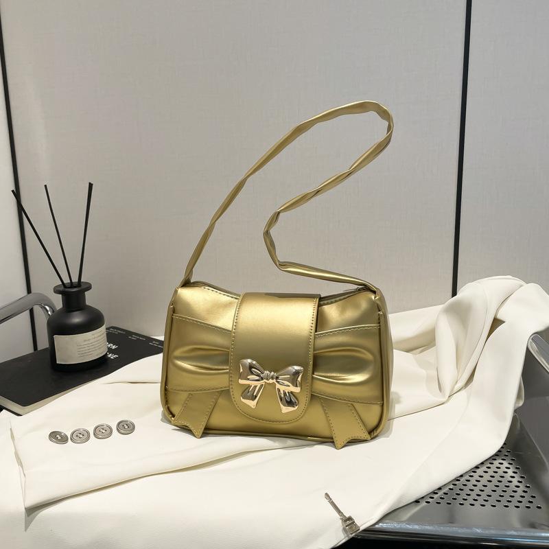 ins Французская нишевая текстурная сумка женская 2025 лето новая сумка под мышкой с бантом иностранная и красивая сумка на плечо золотой