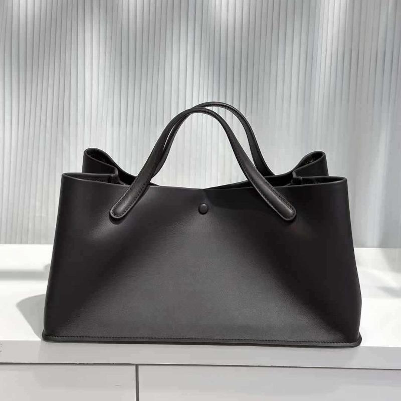 Новая минималистичная сумка-тоут из коровьей кожи, женская сумка для通勤, сумка через плечо класса люкс, женская сумка высокого класса 38*20*20cm эбеновый
Новая минималистичная сумка-тоут из коровьей кожи, женская сумка для通勤, сумка через плечо класса люкс, женская сумка высокого класса 38*20*20cm эбеновый