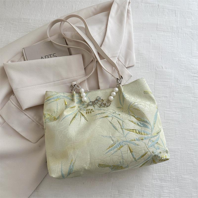 Большая вместимость, модная корейская версия сумки через плечо с жемчужной цепочкой для женщин на весну и лето, новая высококачественная сумка-тоут для женщин
Большая вместимость, модная корейская версия сумки через плечо с жемчужной цепочкой для женщин на весну и лето, новая высококачественная сумка-тоут для женщин