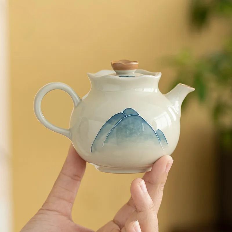 Ice Table Hand-painted Mountain LAN Teapot Flower Mouth Pot New Chinese Ceramic Home Single Pot Tea Pot Cut Tea Pot
Ice Table Hand-painted Mountain LAN Teapot Flower Mouth Pot New Chinese Ceramic Home Single Pot Tea Pot Cut Tea Pot
