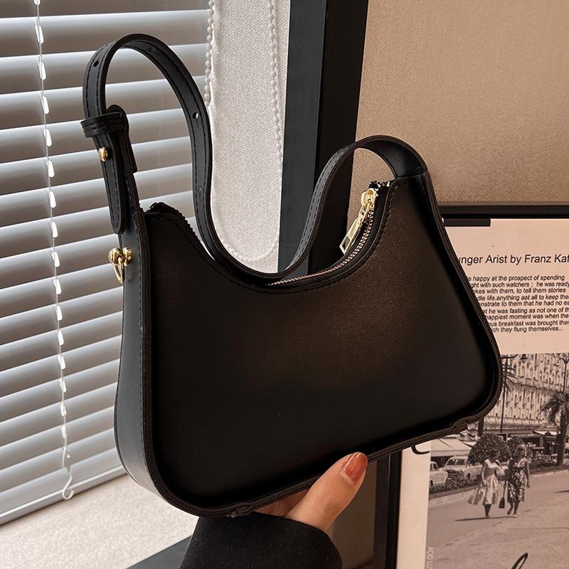 Премиальная текстура нишевой сумки для женщин 2024 года, новая летняя универсальная сумка этого года, популярная французская белая сумка через плечо подмышкой чёрный