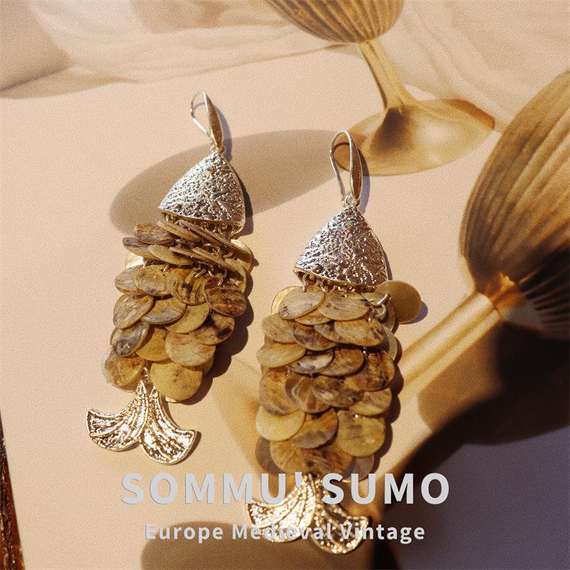 Medieval vintage retro temperament brass silver plated Luo shell fringed fish scale earrings earrings women
Medieval vintage retro temperament brass silver plated Luo shell fringed fish scale earrings earrings women