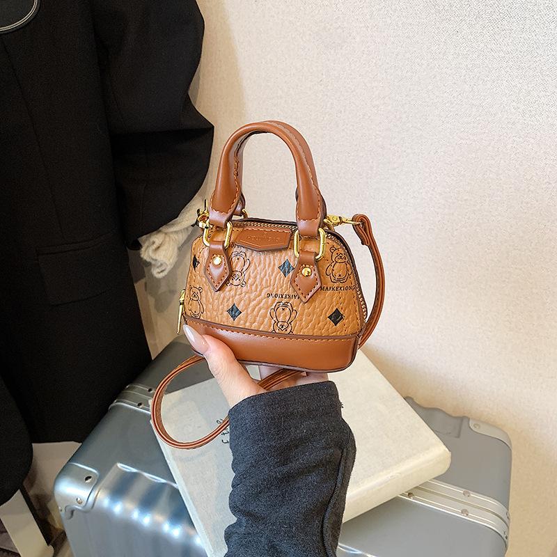 Stylish Childrens Handbag With Exquisite Shell Shape And Trendy Designs For School And Play коричневий
Stylish Childrens Handbag With Exquisite Shell Shape And Trendy Designs For School And Play коричневий