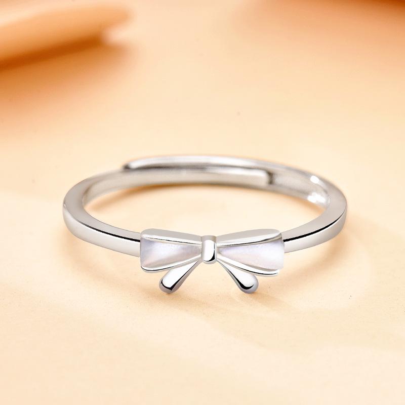 S925 Sterling Silver Mother-of-Pearl Bow Ring, Adjustable Pinky or Index Finger Design, Trendy and Fresh Style. Adjustable Open
S925 Sterling Silver Mother-of-Pearl Bow Ring, Adjustable Pinky or Index Finger Design, Trendy and Fresh Style. Adjustable Open