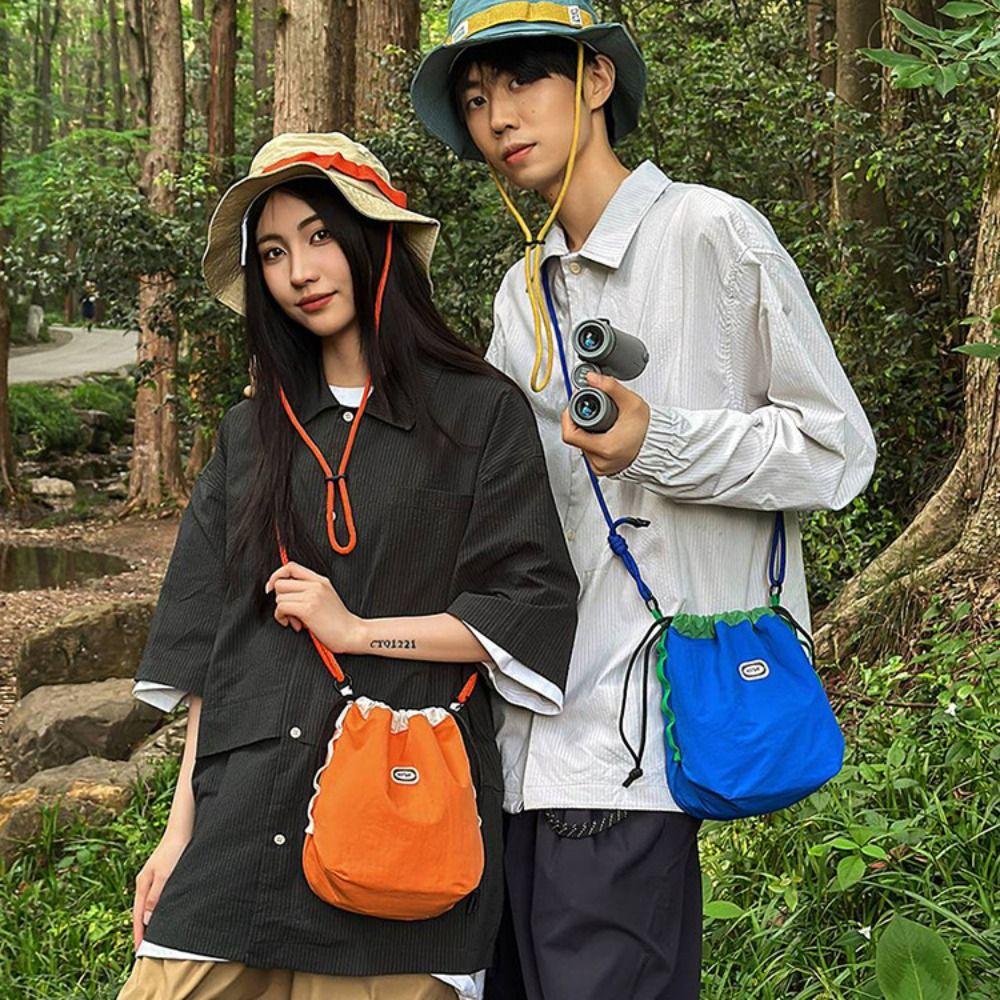 Solid Color Drawstring Crossbody Bag Coin Pouch Mobile Phone Pack Nylon Shoulder Bag Outdoor синій
Solid Color Drawstring Crossbody Bag Coin Pouch Mobile Phone Pack Nylon Shoulder Bag Outdoor синій