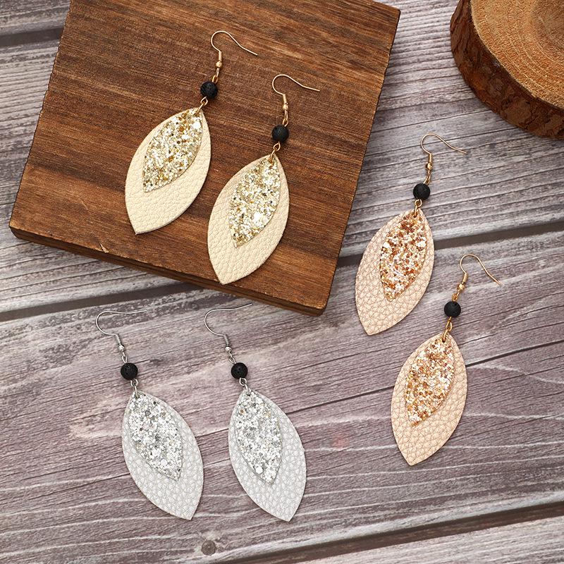 Leaf-Shaped Volcanic Stone Leopard Print Leather Earrings - European & American Western Style
Leaf-Shaped Volcanic Stone Leopard Print Leather Earrings - European & American Western Style