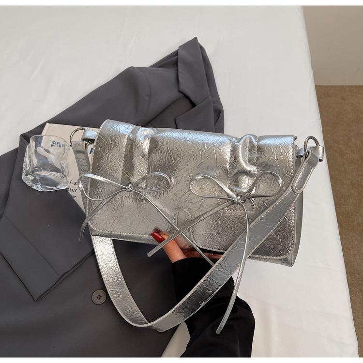 Summer niche simple women s bag 2025 new girly bow small square bag versatile shoulder messenger bag срібний
Summer niche simple women s bag 2025 new girly bow small square bag versatile shoulder messenger bag срібний