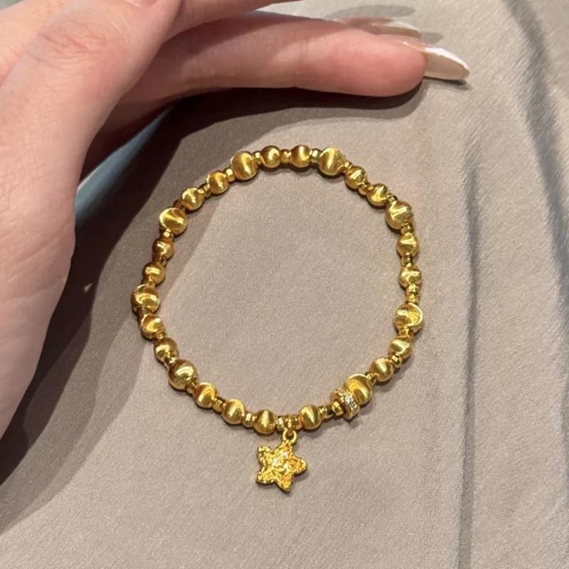 2026 Sand Gold Brushed Cat s Eye Hammer Pattern Star Dancing Bead Bracelet Women s Diamond Running Ring Transfer Bead Elastic Rope Bracelet
2026 Sand Gold Brushed Cat s Eye Hammer Pattern Star Dancing Bead Bracelet Women s Diamond Running Ring Transfer Bead Elastic Rope Bracelet