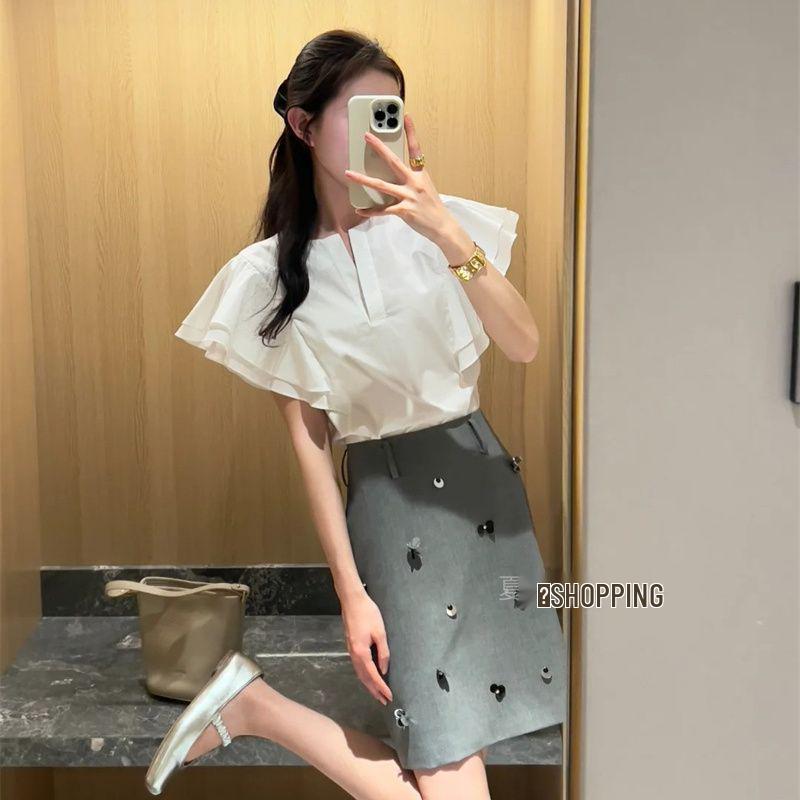 Elegant Ruffled Puff Sleeve Top & High Waist A-Line Beaded Skirt Set - Women s Summer Two-Piece Outfit S
Elegant Ruffled Puff Sleeve Top & High Waist A-Line Beaded Skirt Set - Women s Summer Two-Piece Outfit S