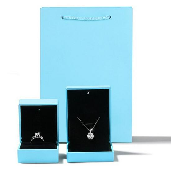 Gift Box: Light-Up Pendant, Ring, and Earring Jewelry Box for Couples and Elders Light Blue Pendant Box + Handbag
Gift Box: Light-Up Pendant, Ring, and Earring Jewelry Box for Couples and Elders Light Blue Pendant Box + Handbag