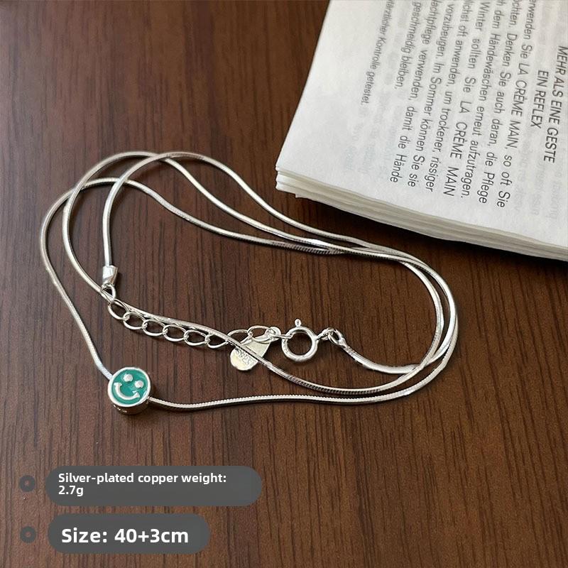 Colorful smiley face enamel necklace - versatile, high-end snake chain for women - stackable fashion accessory
Colorful smiley face enamel necklace - versatile, high-end snake chain for women - stackable fashion accessory