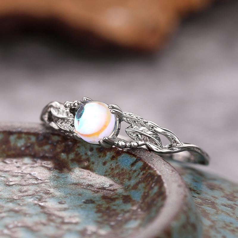 Huitan Imitation Moonstone Women Rings with Delicate Leaves Creative Design Temperament Elegant Female Rings Vintage Zircon 6
Huitan Imitation Moonstone Women Rings with Delicate Leaves Creative Design Temperament Elegant Female Rings Vintage Zircon 6