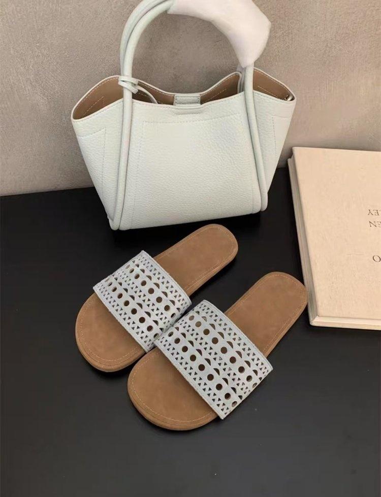 Retro hollow-woven one-word with cool slippers for women to wear open-toed flat-bottomed beach cool slippers 40 синий
Retro hollow-woven one-word with cool slippers for women to wear open-toed flat-bottomed beach cool slippers 40 синий